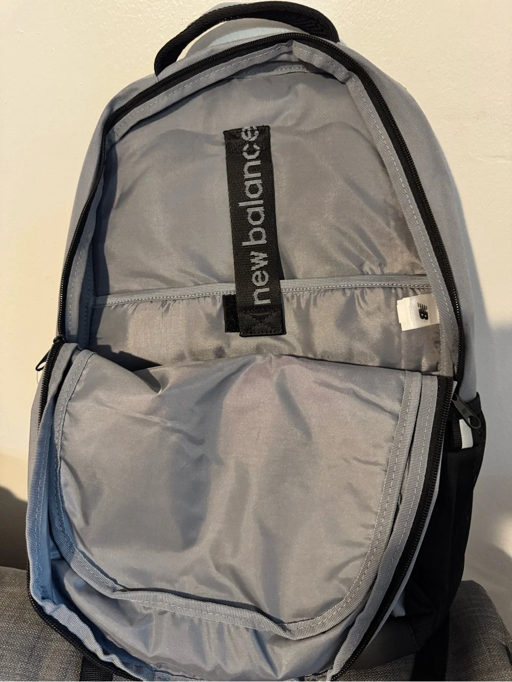 New Balance Light Gray and Black Men's Backpack with Bold Logo